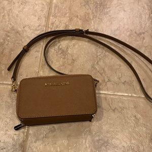 Small like new Michael Kors cross body bag with card slots